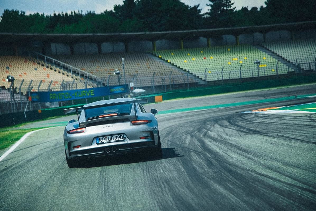 Car on track of a motor speedway